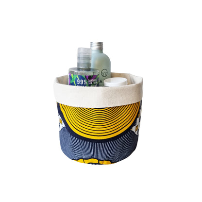 Osime Home medium Plant and Storage Pot with body wash, mouth wash and face toner stored inside.